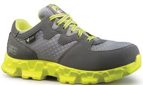 A pair of yellow and grey composite work shoes.